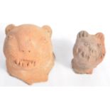 TWO BELIEVED PRE COLUMBIAN ERA POTTERY ANIMAL HEADS