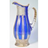 19TH CENTURY COBALT AND GILT BOHEMIAN GLASS JUG