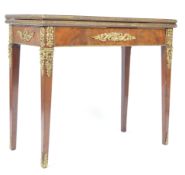 19TH CENTURY FLAME MAHOGANY AND GILT ORMULU CARD GAMES TABLE