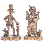 RARE PAIR OF MR & MRS SLOPER CAST IRON DOOR STOPS