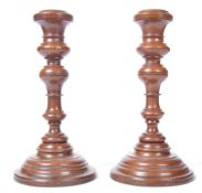 PAIR OF 19TH CENTURY TURNED WOOD TREEN CANDLESTICKS