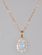A stamped 18ct gold pendant necklace having a pend