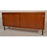 A retro mid 20th Century teak wood sideboard crede