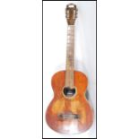 A 20th Century Columbia Junior six string acoustic