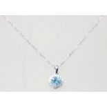 An 18ct white gold pendant necklace, the pendant s