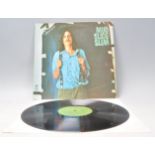 A vinyl long play LP record album by James Taylor