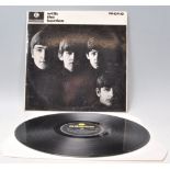 A vinyl long play LP record album by The Beatles –