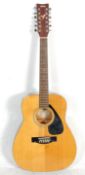 A good Yamaha FG-411-12 twelve string acoustic gui