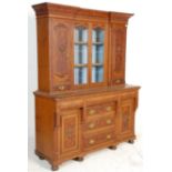 A large 19th century Victorian dresser being raise