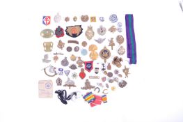 COLLECTION OF ASSORTED MILITARY CAP BADGES & PATCHES