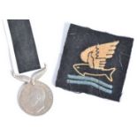 WWII SERVICE TO NEW ZEALAND MEDAL & GOLDFISH CLUB PATCH