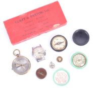 COLLECTION OF WWII ESCAPE COMPASSES & RELATED EFFECTS