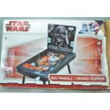 A new and unused Star Wars boxed Pinball machine toy game. Appears complete. Box A/F.