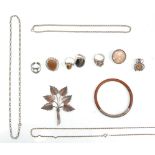 A group of silver jewellery to include a spider brooch set with coloured paste stones, necklaces,