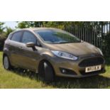 WR13 BJK - Ford Fiesta - Automatic - A 2013 Ford Fiesta in metallic gold, 1596cc, Titanium, petrol