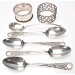 A mixed group of silver hallmarked table wares to include four tea spoons hallmarked for Newcastle