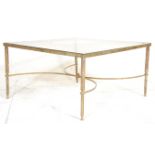 A mid 20th Century French brass framed square coffee occasional table having a brass frame with