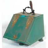 A 19th Century Victorian tin green painted coal scuttle having an angular lidded front having
