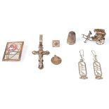 A collection of silver jewellery to include a pair of Egyptian silver hieroglyphics earrings, a