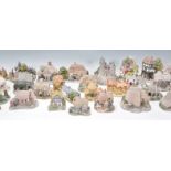 A good collection of Lilliput Lane resin cast character cottages / houses to include many