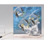 A Swarovski ' Wonders of the Sea ' cut crystal free standing ornament plaque / light in the form