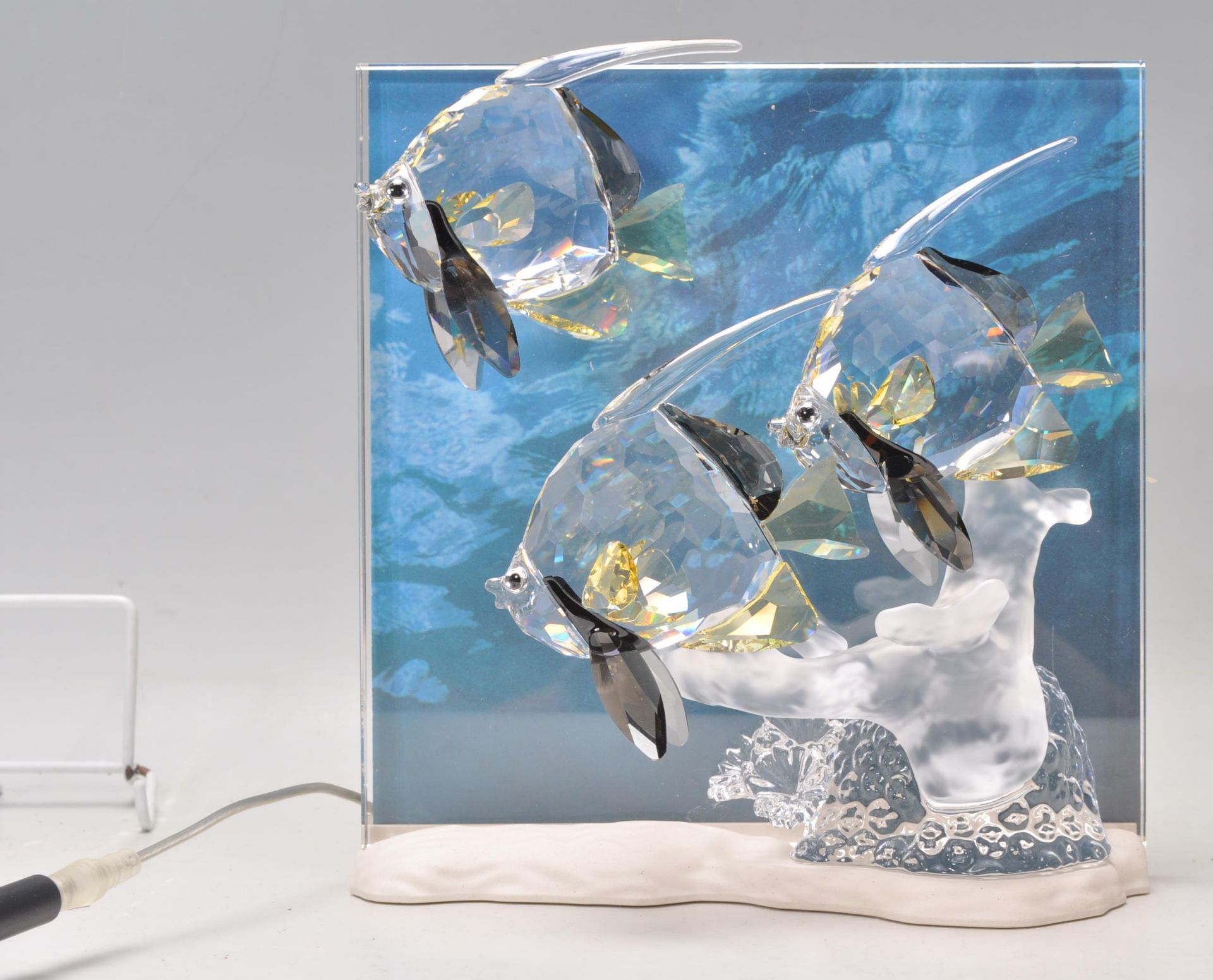 A Swarovski ' Wonders of the Sea ' cut crystal free standing ornament plaque / light in the form