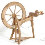 A mid 20th Century Ashford traditional wooden spinning wheel complete with original manual and