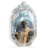 A large 20th Century Venetian wall mirror of tall octagonal form having a cut glass baroque style