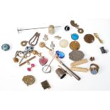 A collection of vintage jewellery and related items to include a turned bone needle case, a mother