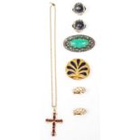 Christian Dior / Estee Lauder - A mix of designer costume jewellery to include a gilt cross set with
