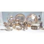 A large collection of silver plated wares to include coffee pot, teapot, condiments, dressing