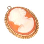 A vintage 9ct gold mounted cameo pendant necklace having a rope twist gold surround. Hallmarked