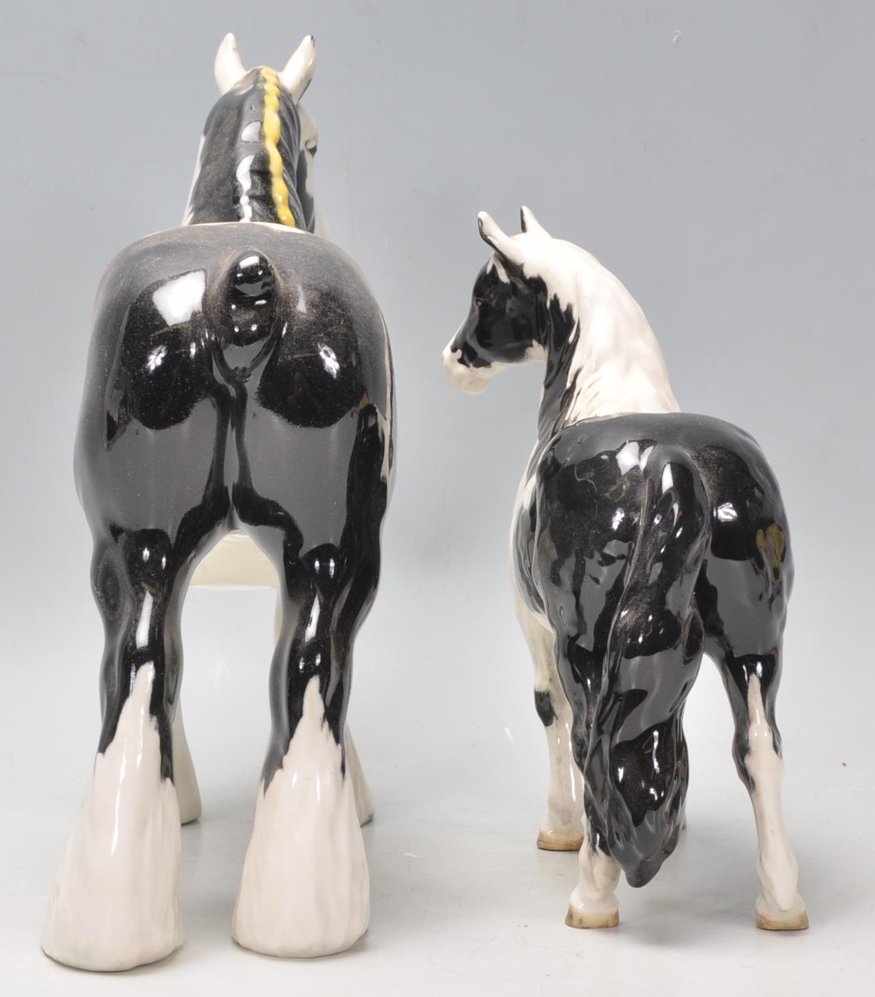 A  collection of Beswick horse porcelain figurines to include a piebald coloured shire horse and a - Image 4 of 8