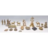 A collection of vintage and antique brass ware to include an Indian brass mythical beast figurine,