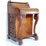 A 19th Century Victorian figured walnut piano shaped davenport writing desk bureau. The desk  with