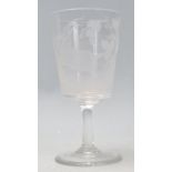 A 19th Century Victorian wine glass / goblet, the tapering bowl having etched decoration in the form
