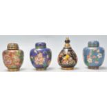 A group of four 20th Century Chinese Cloisonne miniature lidded vases each having a different floral