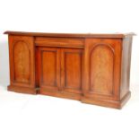 A 19th Century Victorian mahogany inverted breakfront  sideboard having a cupboard base with central