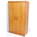 A vintage retro 20th Century William Lawrence teak wood double wardrobe having having twin doors