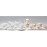 An early 20th century Royal Albert Elfin pattern tea services comprising 6 cups, saucers and