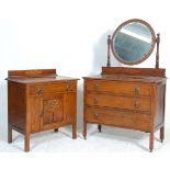 An early 20th Century, circa 1920's Jacobean revival oak dressing chest of drawers having a round