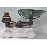 A good pair of early 20th Century W & T. Avery shopkeepers / kitchen scales having a white