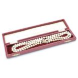 A set of vintage 20th Century Pompadour cultured pearls having two strands on a 9ct gold clasp