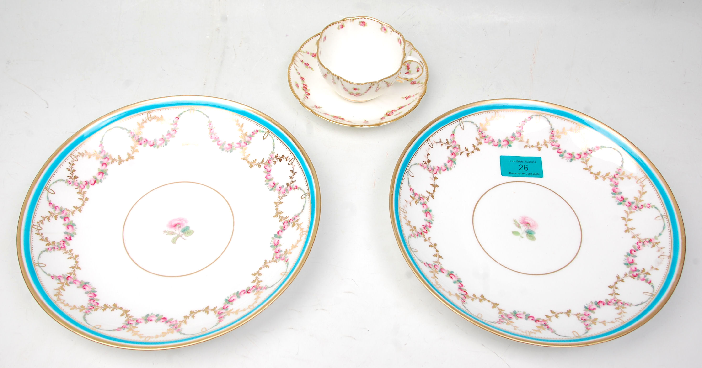 A pair of antique 19th Century Victorian Minton porcelain cabinet plates having painted with rose