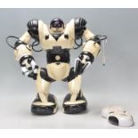 A vintage Robosapien toy robot. With remote control.