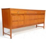 A 20th Century 1970's retro Nathan Long John teak wood sideboard credenza raised on shaped legs