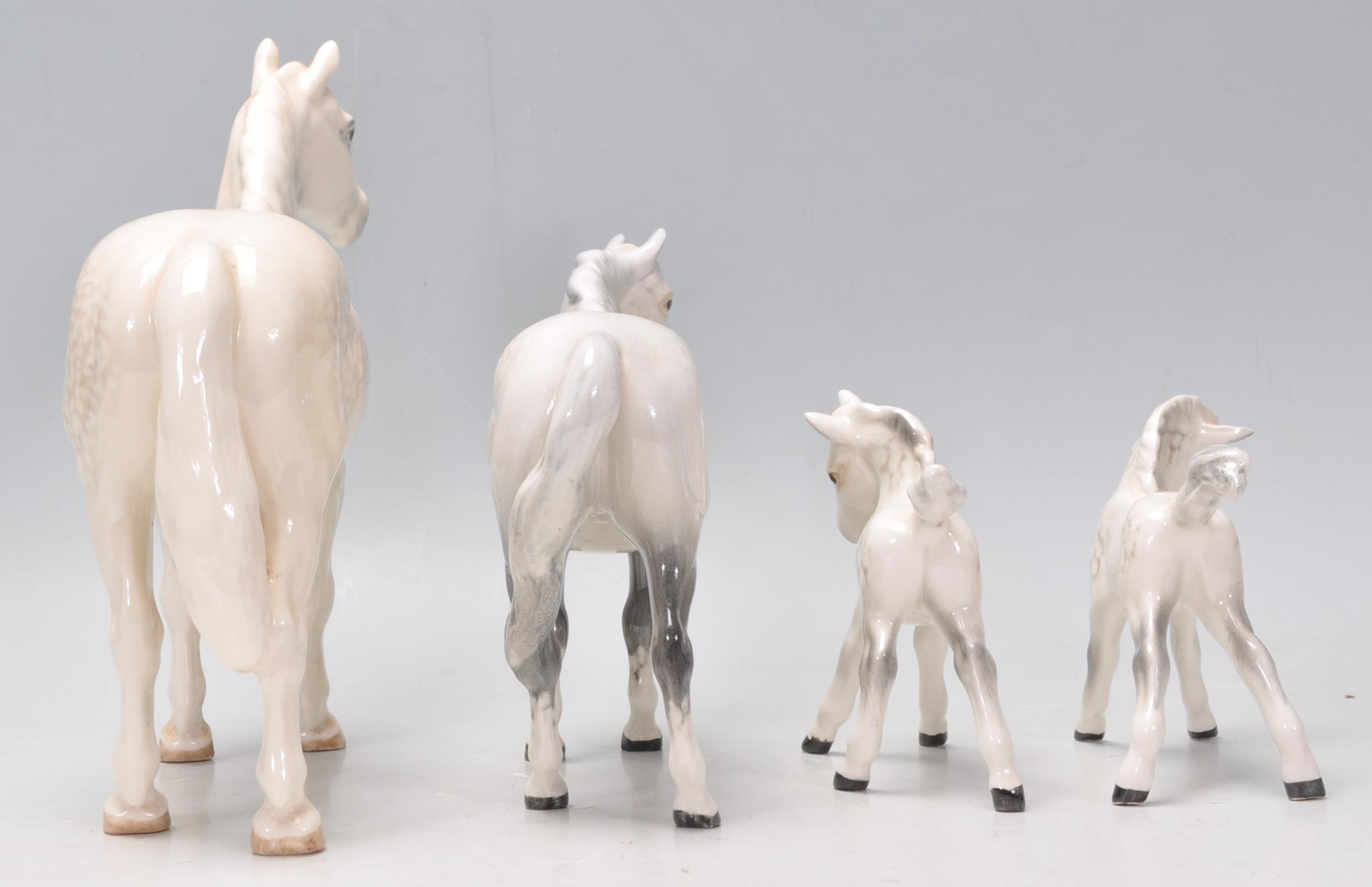 A  collection of 2 Beswick horse porcelain figurines to include 2 dapple grey coloured mares, all - Image 4 of 8