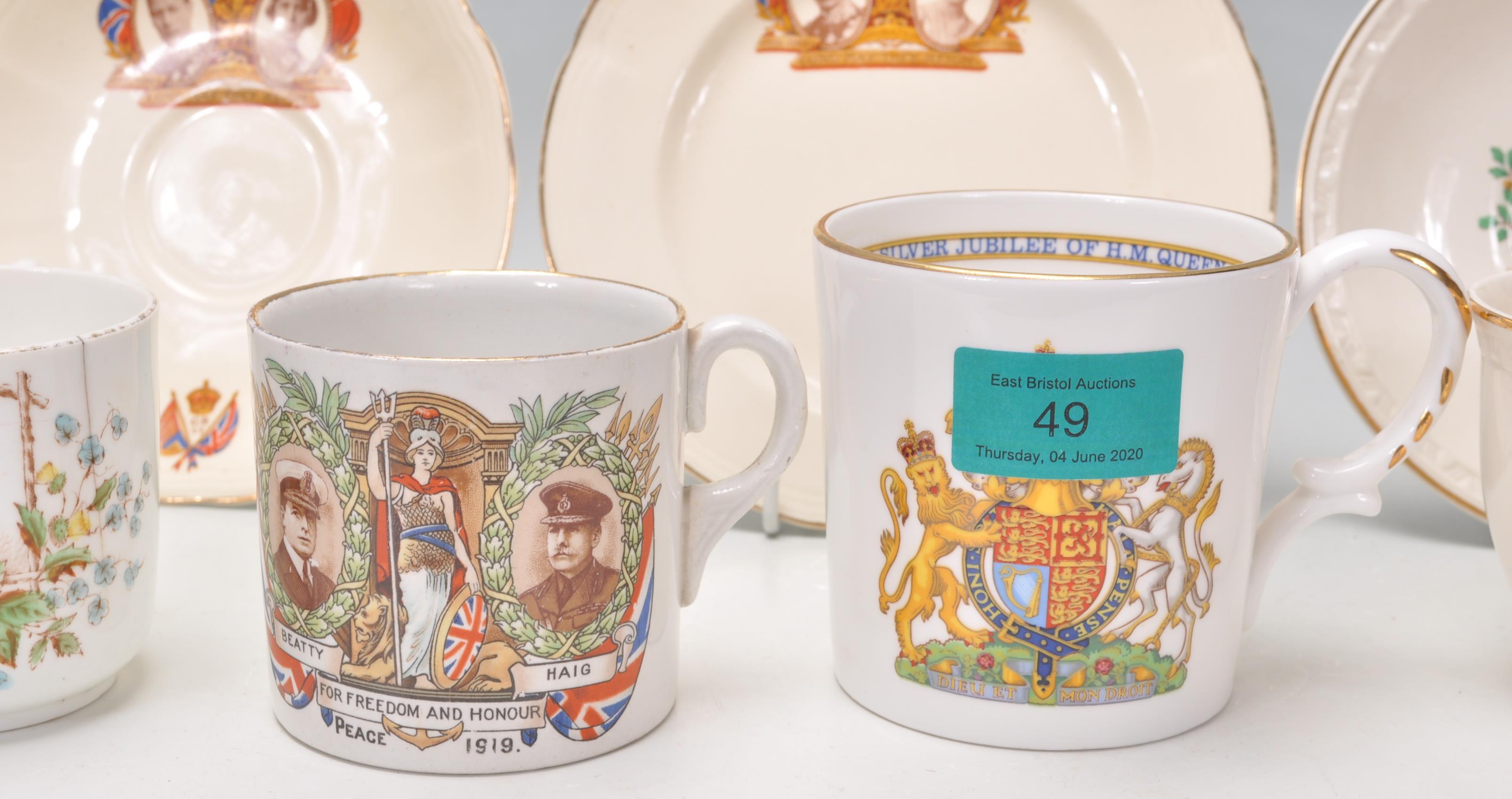 A collection of commemorative Royal memorabilia mugs to include a Queen Victoria mug, a First - Image 3 of 12