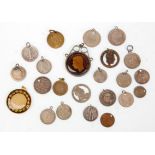 A collection of mixed coin pendants to include five Victorian coins, two George IIII coins, George