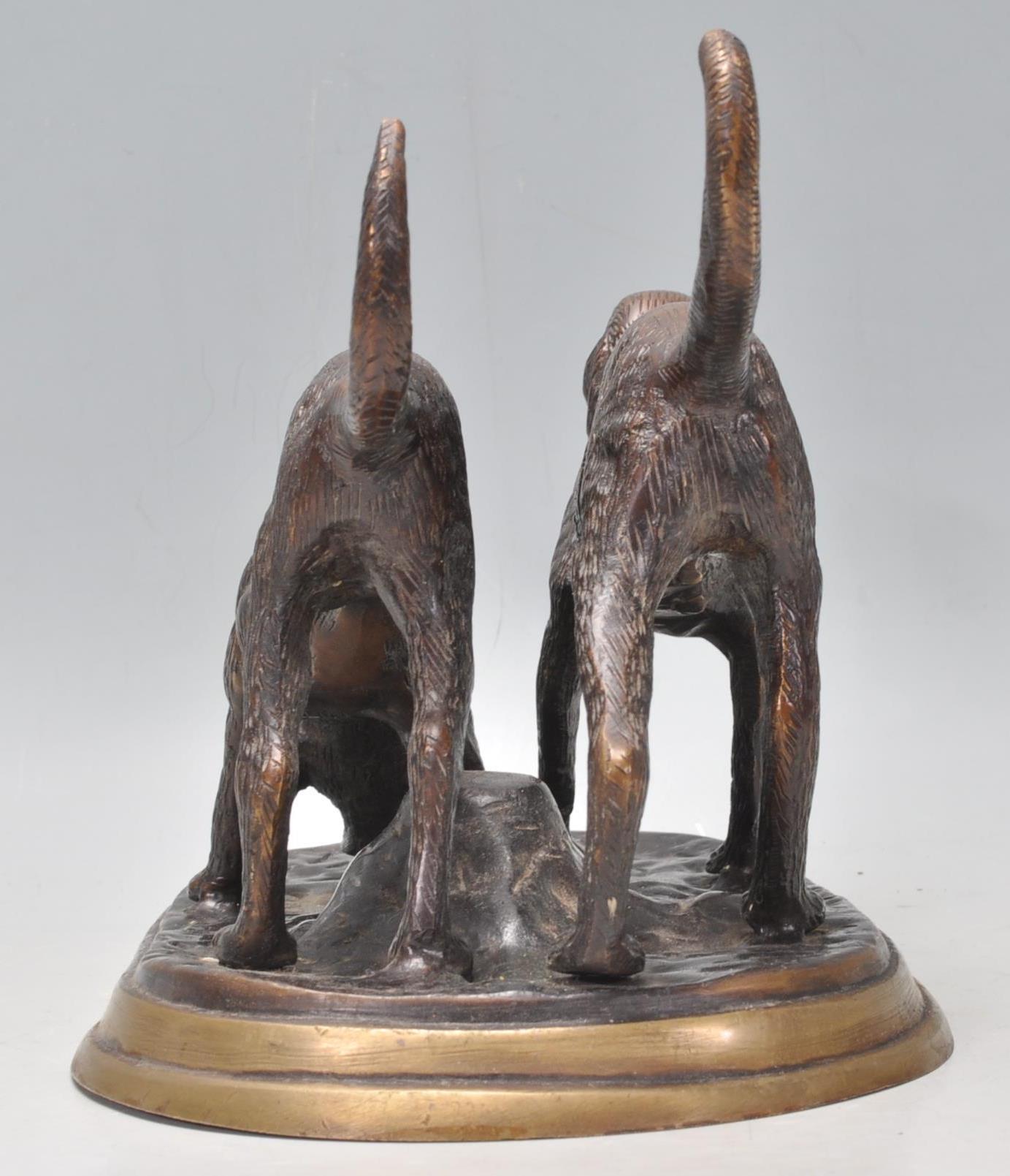 A vintage 20th Century bronze figure depicting a two hunting dogs. Raised on a rounded base. - Image 4 of 7